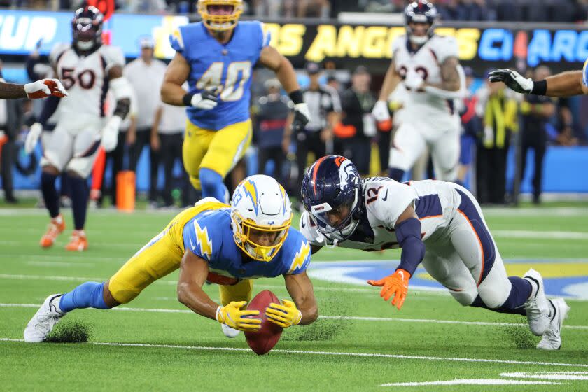 Photos | Muffed punt leads to Chargers win over Broncos