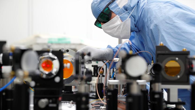 A technican of Trumpf, a hidden Champion of the German Mittelstand that supplies CO2 laser technology to Dutch ASML and the leader of semiconductor lithography machines, adjusts optical parts for one of their CO2 lasers at the Trumpf headquarters in Ditzingen, Germany, May 15, 2019. Picture taken May 15, 2019. REUTERS/Kai Pfaffenbach