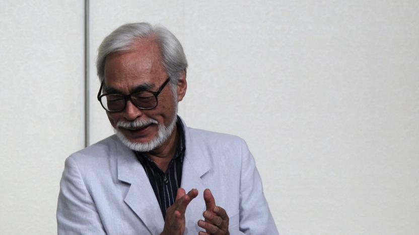 Japanese director Hayao Miyazaki claps his hands after a news conference held to announce his retirement from film in Tokyo September 6, 2013. Miyazaki, known for animated films like the Oscar-winning "Spirited Away", said he would retire following the release of his latest movie "The Wind Rises". REUTERS/Yuya Shino  (JAPAN - Tags: ENTERTAINMENT)