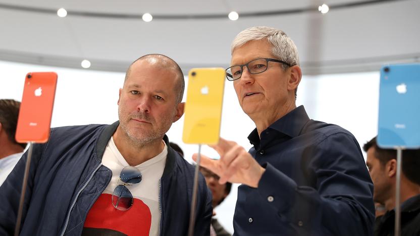 CUPERTINO, CA - SEPTEMBER 12:  Apple chief design officer Jony Ive (L) and Apple CEO Tim Cook inspect the new iPhone XR during an Apple special event at the Steve Jobs Theatre on September 12, 2018 in Cupertino, California.  Apple released three new versions of the iPhone and an update Apple Watch.  (Photo by Justin Sullivan/Getty Images)