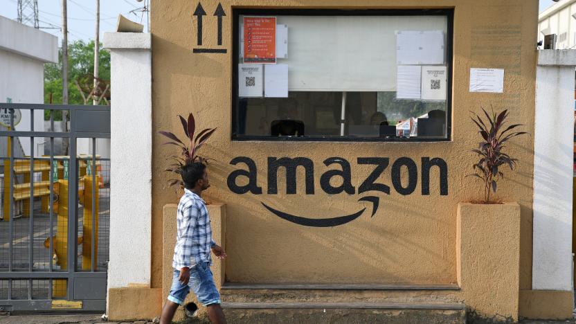 MUMBAI, MAHARASHTRA, INDIA - 2021/10/01: A man walks past the security cabin outside an Amazon warehouse.
Amazon is an e-commerce company selling different variety of goods online to shoppers on their website. (Photo by Ashish Vaishnav/SOPA Images/LightRocket via Getty Images)