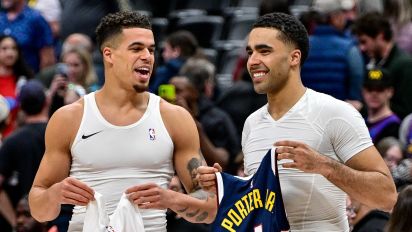 Getty Images - DENVER, COLORADO - MARCH 11: Michael Porter Jr. #1 of the Denver Nuggets and Jontay Porter #34 of the Toronto Raptors swap jerseys after a game at Ball Arena on March 11, 2024 in Denver, Colorado. NOTE TO USER: User expressly acknowledges and agrees that, by downloading and or using this photograph, User is consenting to the terms and conditions of the Getty Images License Agreement.  (Photo by Dustin Bradford/Getty Images)