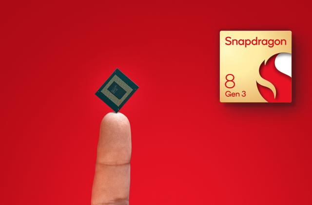 Qualcomm's Snapdragon 8 Gen 3 chipset balanced on a fingertip