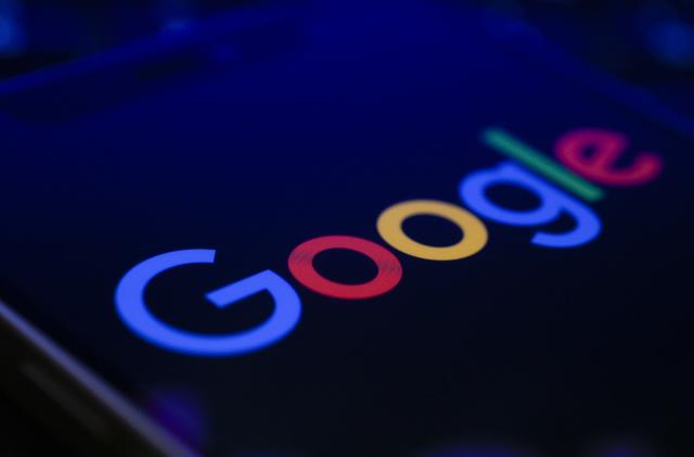 The Google logo is seen on a mobile device screen in this photo illustration in Warsaw, Poland on 04 February, 2023. (Photo by Jaap Arriens/NurPhoto via Getty Images)