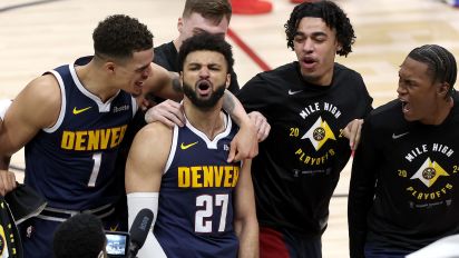 Getty Images - DENVER, COLORADO - APRIL 29: Jamal Murray #27 of the Denver Nuggets celebrates with his teammates after making a basket in the final seconds tom defeat the Los Angeles Lakers during game five of the Western Conference First Round Playoffs at Ball Arena on April 29, 2024 in Denver, Colorado. NOTE TO USER: User expressly acknowledges and agrees that, by downloading and or using this photograph, User is consenting to the terms and conditions of the Getty Images License Agreement.  (Photo by Matthew Stockman/Getty Images)
