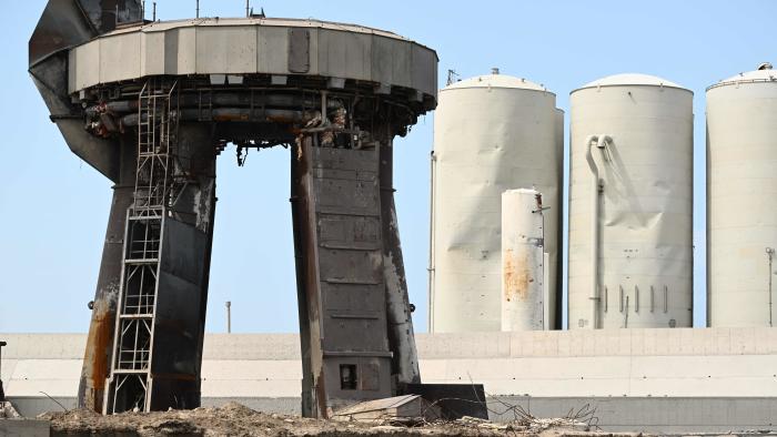 Debris litters the launch pad and dmaged tanks (R rear) on April 22, 2023, after the SpaceX Starship lifted off on April 20 for a flight test from Starbase in Boca Chica, Texas. - The rocket successfully blasted and the Starship capsule had been scheduled to separate from the first-stage rocket booster three minutes into the flight but separation failed to occur and the rocket blew up. (Photo by Patrick T. Fallon / AFP) (Photo by PATRICK T. FALLON/AFP via Getty Images)