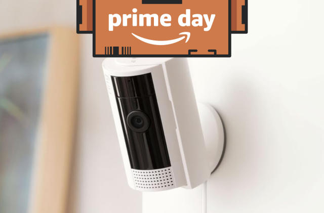 Ring Indoor Cam mounted on a wall with a Prime Day logo superimposed on top.