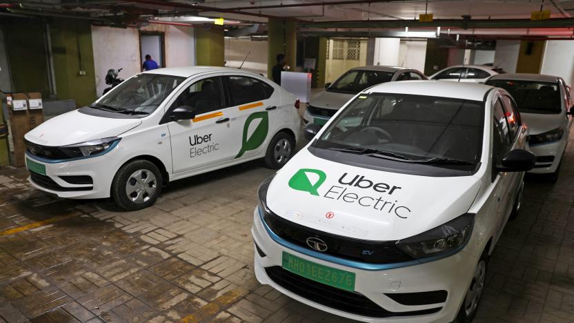 Uber electric taxis are seen at a parking lot in Mumbai, India, February 21, 2023. 