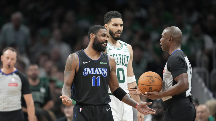 Associated Press - Dallas Mavericks guard Kyrie Irving (11) questions referee Courtney Kirkland after he was called for a foul, as Boston Celtics forward Jayson Tatum (0) listens during the second half of Game 1 of basketball's NBA Finals on Thursday, June 6, 2024, in Boston. (AP Photo/Charles Krupa)