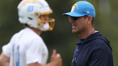 Getty Images - COSTA MESA, CALIFORNIA - MAY 20: Head coach Jim Harbaugh and quarterback Justin Herbert during a Los Angeles Chargers OTA offseason workout on May 20, 2024 in Costa Mesa, California. (Photo by Harry How/Getty Images)