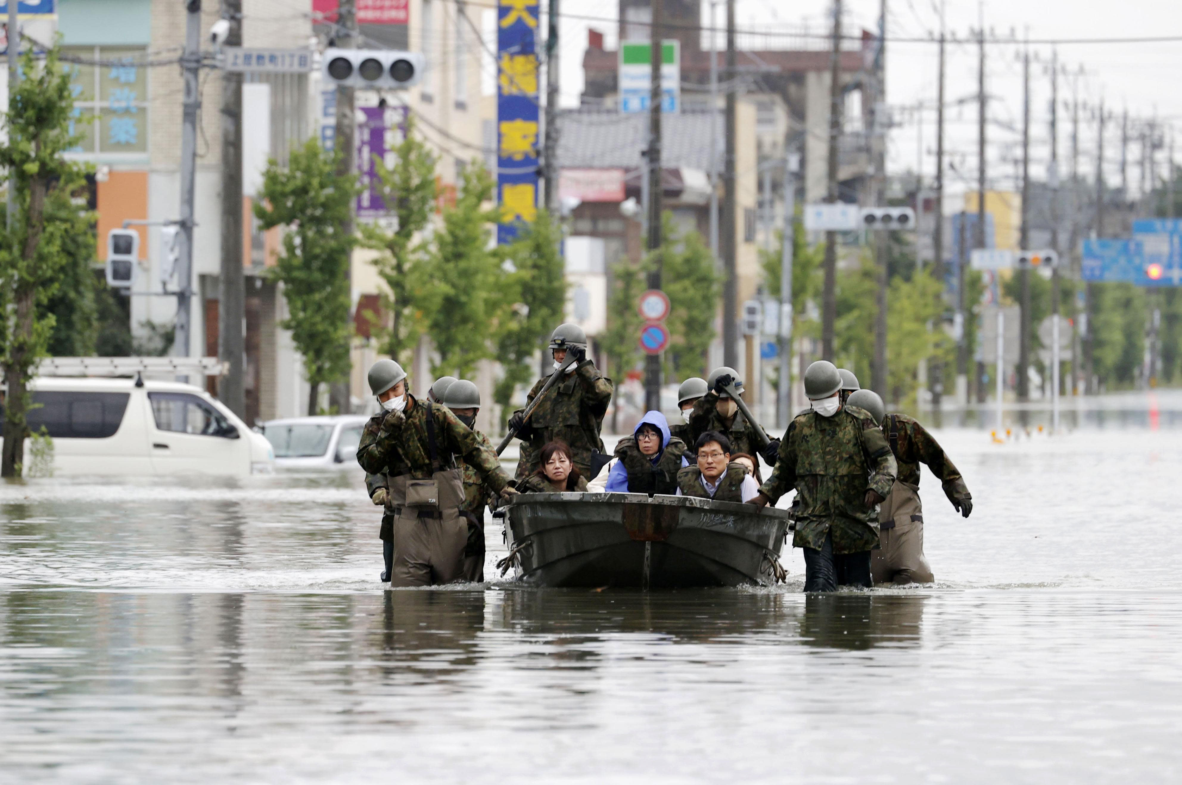 Death toll from flooding in Japan reaches 55, dozen missing