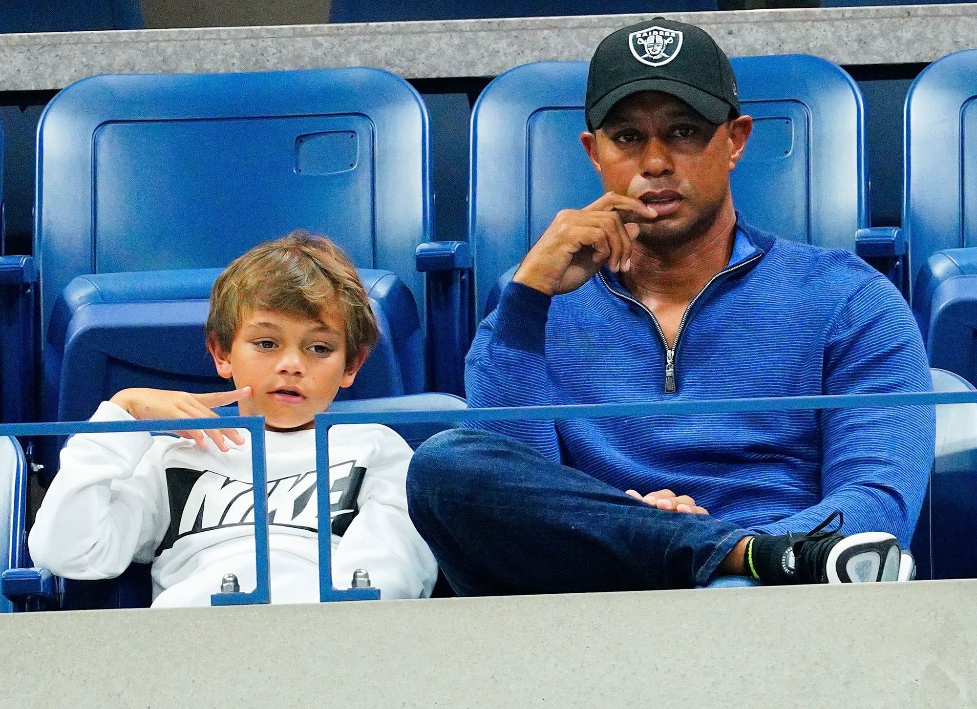 Tiger Woods Caddies for His Son Charlie During Junior Golf ...