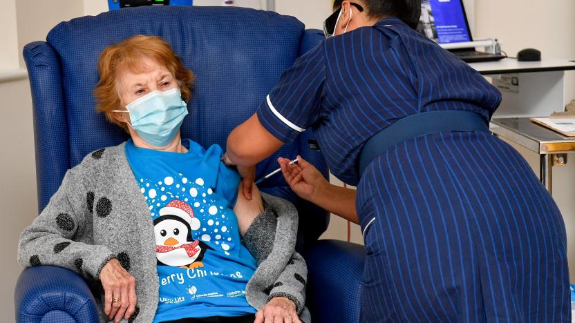 Margaret Keenan, 90, is the first patient in Britain to receive the Pfizer/BioNtech COVID-19 vaccine at University Hospital, administered by nurse May Parsons, at the start of the largest ever immunisation programme in the British history, in Coventry, Britain December 8, 2020. Britain is the first country in the world to start vaccinating people with the Pfizer/BioNTech vaccine. Jacob King/Pool via REUTERS/File Photo     TPX IMAGES OF THE DAY      SEARCH "GLOBAL POY" FOR THIS STORY. SEARCH "REUTERS POY" FOR ALL BEST OF 2020 PACKAGES.