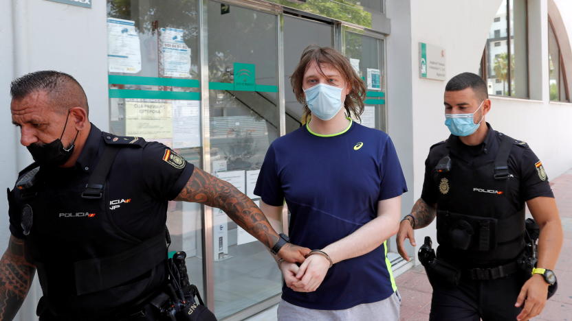 22-year-old British citizen Joseph James O'Connor is lead by Spanish police officers as he leaves a court after being arrested in connection with an alleged July 2020 Twitter hack which compromised the accounts of high-profile politicians and celebrities, according to the U.S. Justice Department, in Estepona, Spain, July 22, 2021. REUTERS/Jon Nazca