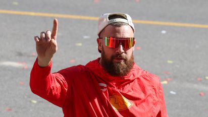 Getty Images - KANSAS CITY, MO - FEBRUARY 14: Travis Kelce wears a wrestling title belt while interacting with fans during the Kansas City Chiefs Super Bowl LVIII Victory Parade on Feb 14, 2024 in Kansas City, MO. (Photo by Scott Winters/Icon Sportswire via Getty Images)