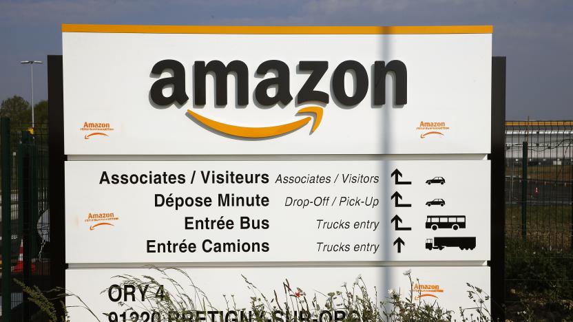 BRETIGNY-SUR-ORGE, FRANCE - APRIL 13: The logo of Amazon is seen at the entrance of the company logistics center on April 13, 2020 in Bretigny-sur-Orge, France. The French government has ordered the American e-commerce giant Amazon to take measures at four of its sites in France to better protect Covid-19 employees. Amazon has been summoned by the "Sud-Solidaires" union, which is calling for the closure of warehouses to protect employees from possible coronavirus contamination. The court decision will be rendered on Tuesday April 14 by the Nanterre court. The Coronavirus (COVID-19) pandemic has spread to many countries across the world, claiming over 115,000 lives and infecting over 1.8 million people. (Photo by Chesnot/Getty Images)