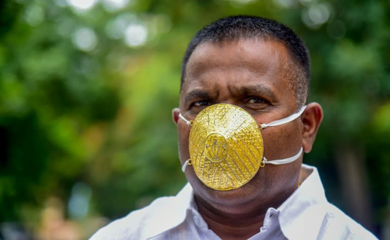 Shankar Kurhade wearing his gold face mask