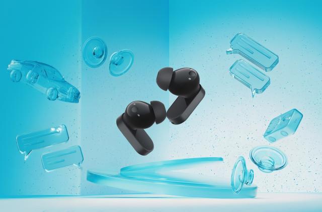 Marketing image showing two black OnePlus Nord Buds 2 earbuds floating in front of a blue background with shapes indicating message bubbles, a car and speakers.