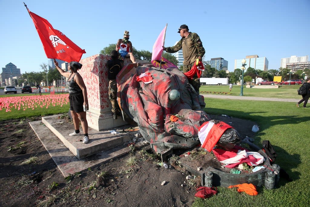 Statue of Queen pulled down by protesters in Canada