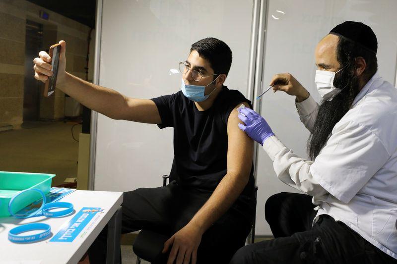 Israel says it has vaccinated 50% of its population against COVID-19