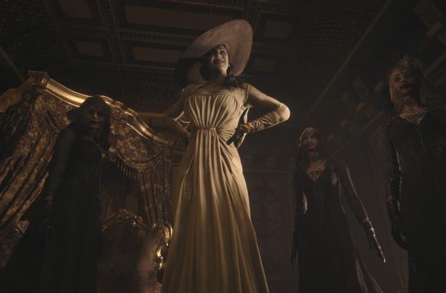 A screenshot of RE Village showing four tall women, one wearing a white dress and a white hat at the center.