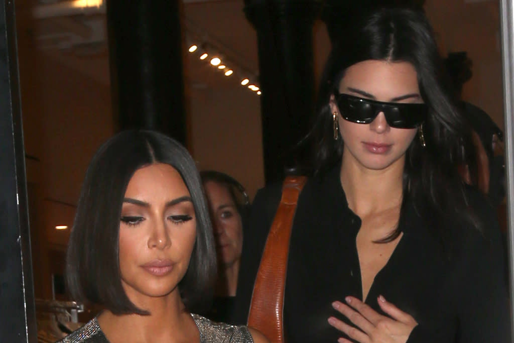 Kim Kardashian & Kendall Jenner Twin in Leather Bustiers, Suede Pants & Classic Rip Boots