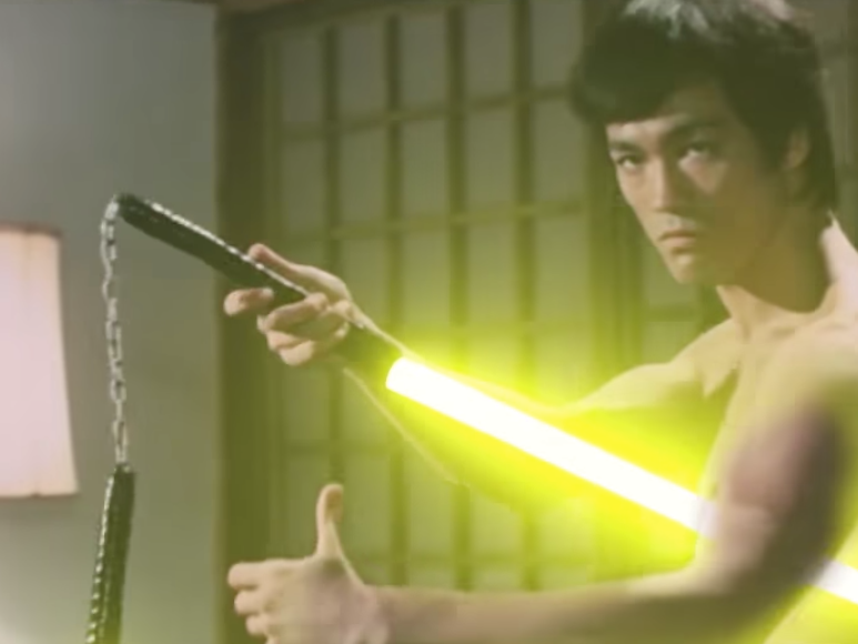 bruce lee fighting with nunchucks