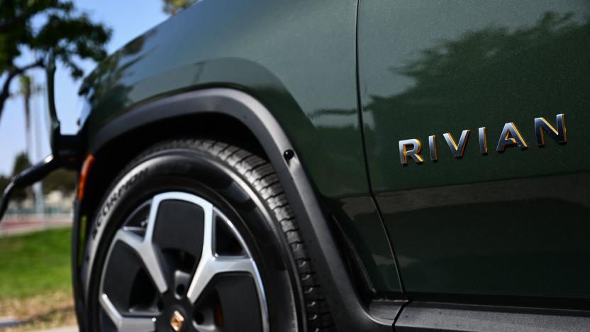 A Rivian R1S electric sports utility vehicle (SUV) charges at a ChargePoint, Inc. public EV charging station in Redondo Beach, California on June 12, 2023. (Photo by Patrick T. Fallon / AFP) (Photo by PATRICK T. FALLON/AFP via Getty Images)