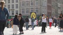 Gittens and Dortmund players celebrate with away fans at Jan Breydel