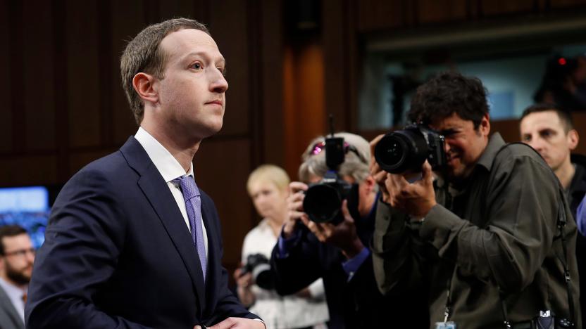 Facebook CEO Mark Zuckerberg stands during a break in testimony before a Senate Judiciary and Commerce Committees joint hearing regarding the company’s use and protection of user data on Capitol Hill in Washington, U.S., April 10, 2018. REUTERS/Aaron P. Bernstein