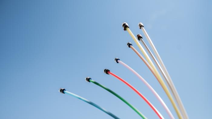 15 July 2024, Baden-Württemberg, Rottweil: Fiber optic cables with various connections protrude from the ground at a construction site near a residential area in Rottweil. Photo: Silas Stein/dpa (Photo by Silas Stein/picture alliance via Getty Images)