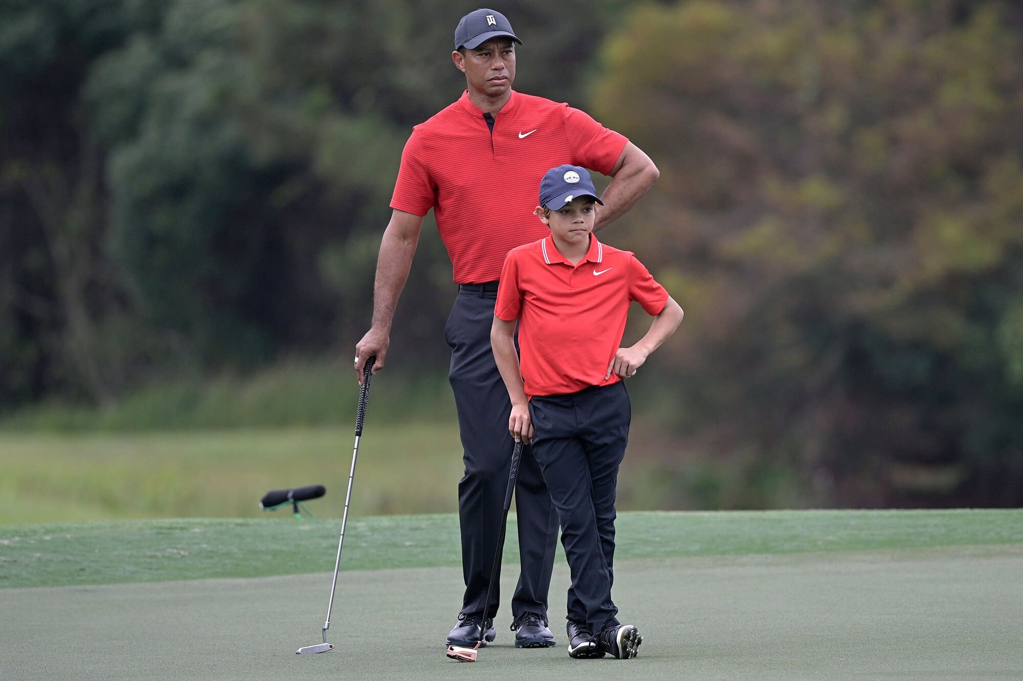 Tiger Woods Gives Son Charlie 11 Big Hug After Showing Off Twinning Swings In First Tournament 