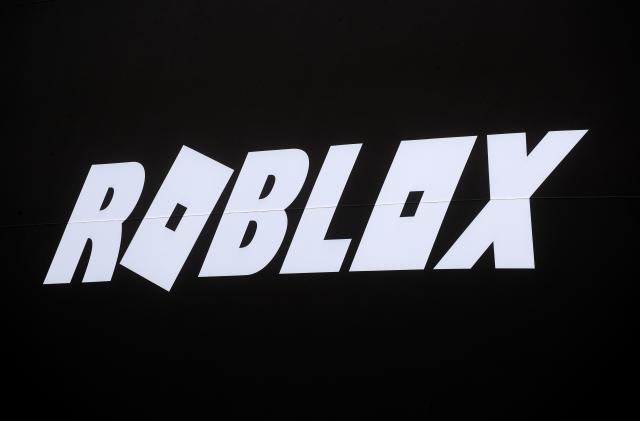 The Roblox logo is displayed on a banner, to celebrate the company's IPO, on the front facade of the New York Stock Exchange (NYSE) in New York, U.S., March 10, 2021. REUTERS/Brendan McDermid