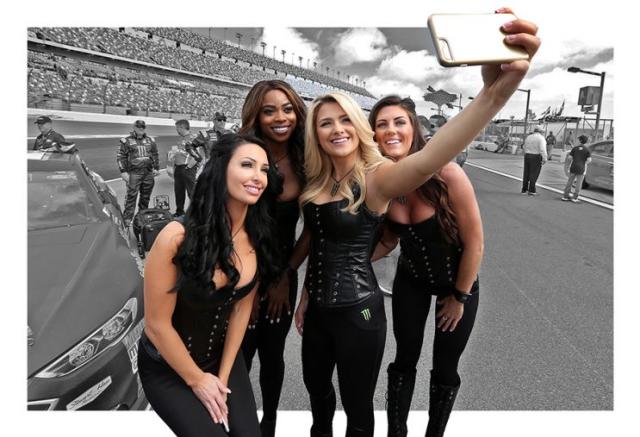 Four Monster Energy girls take a selfie.