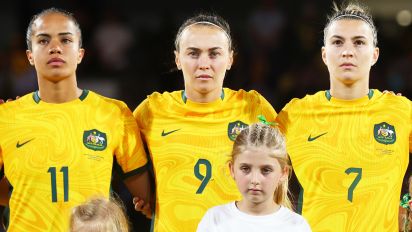 Getty Images - PERTH, AUSTRALIA - NOVEMBER 01: Mary Fowler, Caitlin Foord , Steph Catley, Clare Wheeler and Kyra Cooney-Cross of the Matildas line up for the national anthem during the AFC Women's Asian Olympic Qualifier match between Australia Matildas and Chinese Taipei at HBF Park on November 01, 2023 in Perth, Australia. (Photo by James Worsfold/Getty Images)