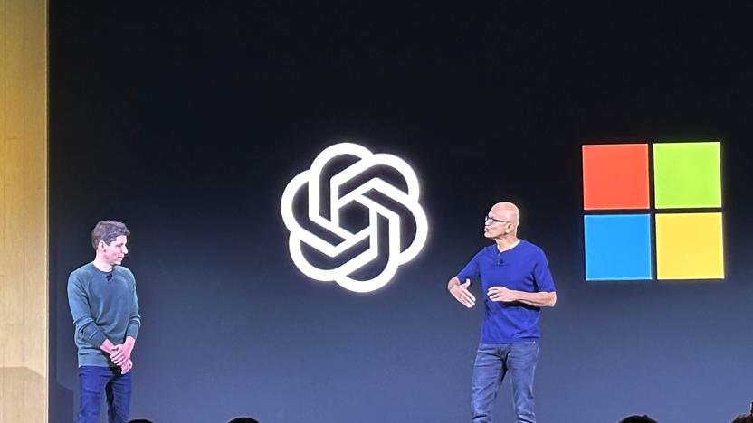 File - Sam Altman, left, appears onstage with Microsoft CEO Satya Nadella at OpenAI's first developer conference, on Nov. 6, 2023, in San Francisco. Microsoft snapped up Altman for a new venture after his sudden departure from OpenAI shocked the artificial intelligence world. (AP Photo/Barbara Ortutay, File)