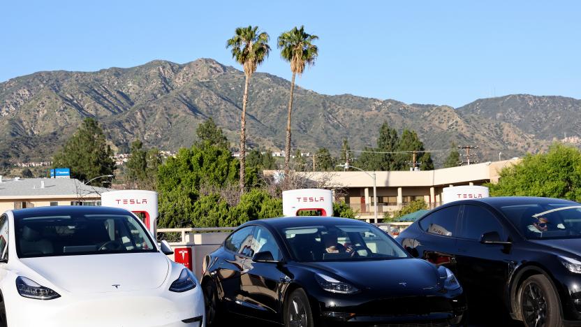 BURBANK, CALIFORNIA - APRIL 14: Tesla cars recharge at a Tesla Supercharger station on April 14, 2022 in Burbank, California. California has unveiled a proposal which would end the sale of gasoline-powered cars while requiring all new cars to have zero emissions by 2035. (Photo by Mario Tama/Getty Images)