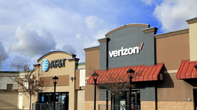 Side by side ATT and Verizon store fronts and entrances at a mall in northern Idaho. (Photo by: Don & Melinda Crawford/Education Images/Universal Images Group via Getty Images)