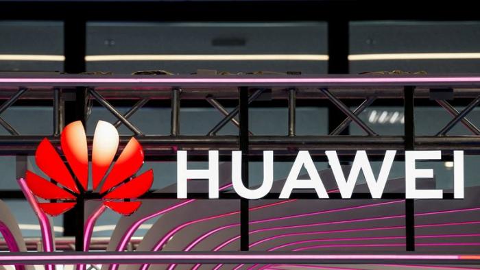 FILE PHOTO: A logo for Huawei is seen during the KubeCon + CloudNativeCon Europe in Paris