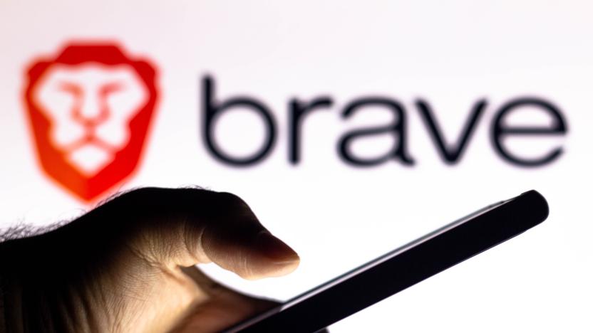 BRAZIL - 2021/01/20: In this photo illustration, a hand of a person holds a smartphone with a Brave Browser logo displayed in the background. (Photo Illustration by Rafael Henrique/SOPA Images/LightRocket via Getty Images)