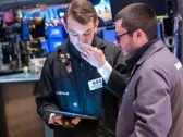 Stock market today: Stocks pull back from records after Dow touches 40,000 for first time