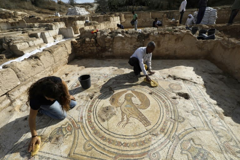 The mosaics in the church depict themes from nature such as leaves, birds and fruit (AFP Photo/MENAHEM KAHANA)
