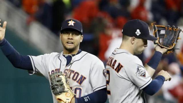 Astros even series with dominant win over Nationals