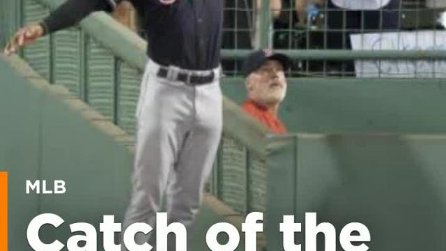 Austin Jackson jumps over wall and into Fenway bullpen to rob home run