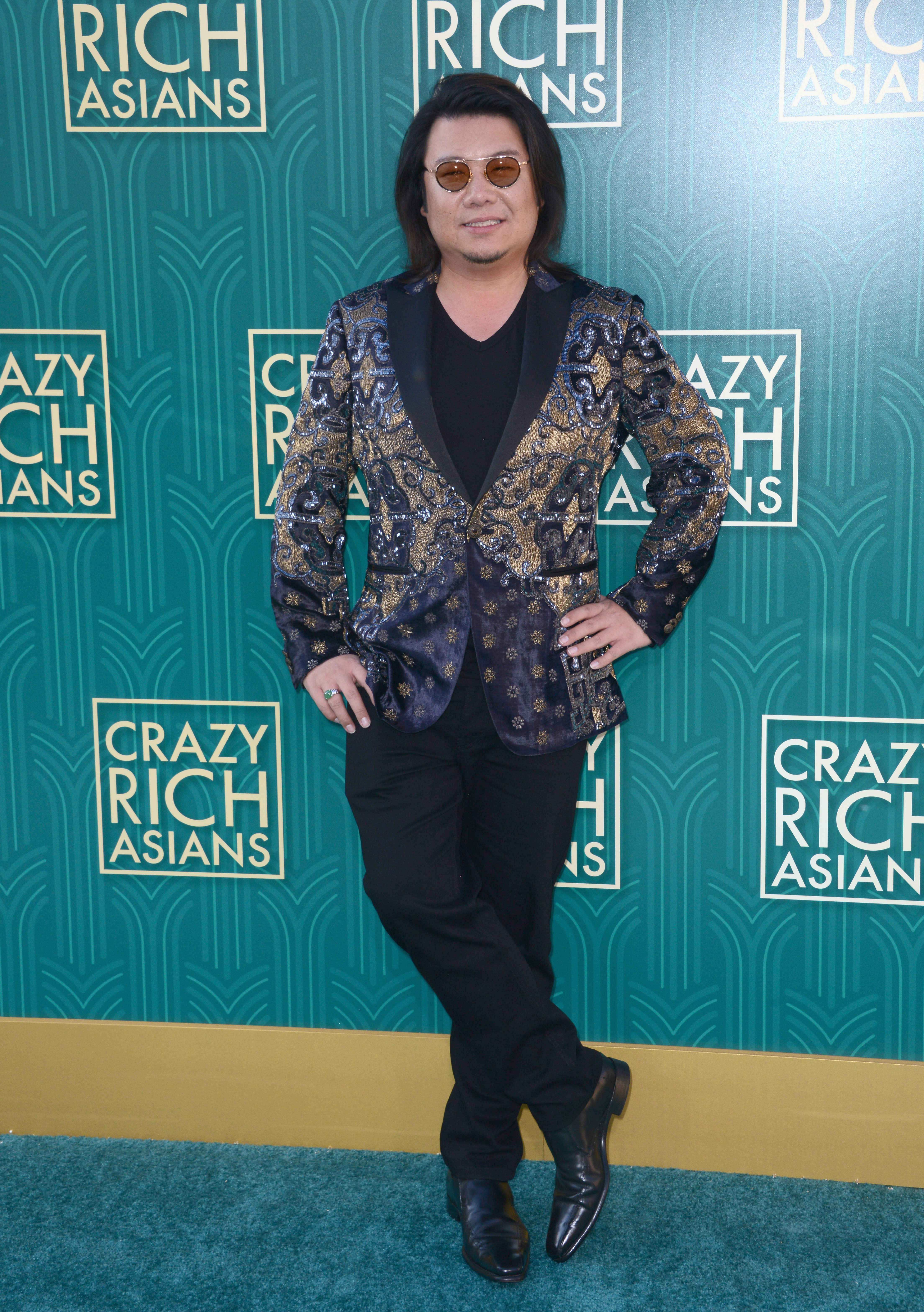 Crazy Rich Asians Author Kevin Kwan Is Wanted In Singapore For