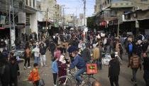 Palestinians crowd at a market area in Rafah in the southern Gaza Strip on March 3, 2024, amid the ongoing conflict between Israel and the Hamas movement. (Photo by AFP) (Photo by -/AFP via Getty Images)