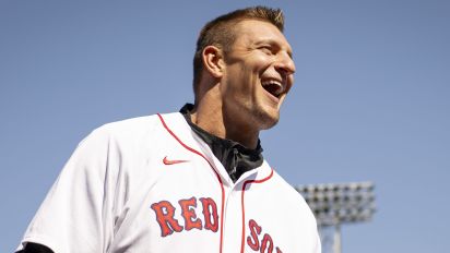 Getty Images - BOSTON, MA - APRIL 15: Rob Gronkowski, former New England Patriots tight end and Grand Marshall for the 2024 Boston Marathon, reacts before throwing a ceremonial first pitch during pre-game ceremonies before a game against the Cleveland Guardians  on April 15, 2024 at Fenway Park in Boston, Massachusetts. (Photo by Maddie Malhotra/Boston Red Sox/Getty Images)