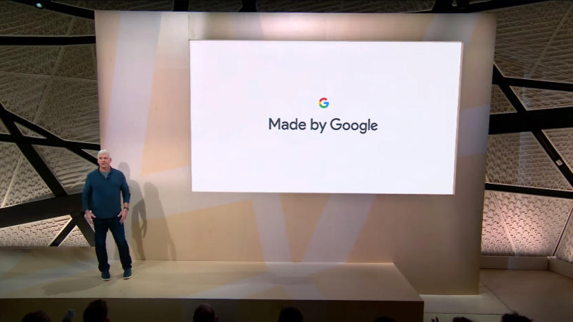 A person standing on a stage in front of a screen that shows the words "Made by Google" below a Google logo.