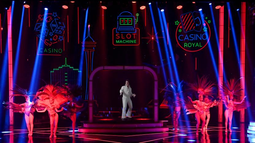 LAS VEGAS, NEVADA - NOVEMBER 28:  Cast members perform with a hologram of Elvis Presley during the "EXTRAVAGANZA - The Vegas Spectacular" show at the Jubilee Theater at Bally's Las Vegas Hotel & Casino on November 28, 2020 in Las Vegas, Nevada. The production opened on March 14, 2020, for only one show before all entertainment on the Las Vegas Strip was shut down to fight the coronavirus (COVID-19) pandemic. The show reopened this week just as a three-week statewide pause went into effect due to surging COVID-19 numbers, forcing producers to adjust to new capacity restrictions limiting audience sizes to 50 people.  (Photo by Ethan Miller/Getty Images)