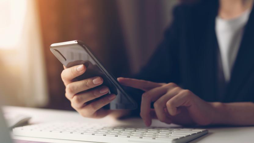 Woman using smartphone. The concept of using the phone is essential in everyday life.